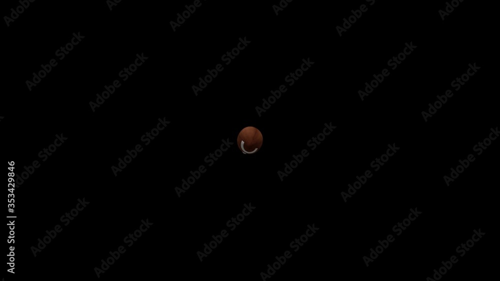 American football thrown by a quarterback on a black screen background American football thrown by a quarterback on a black screen background
