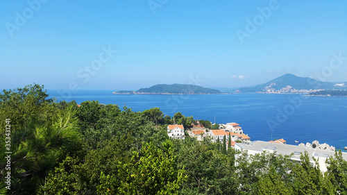 Adriatic sea and green hills near Budva and Becici - landscapes of Montenegro
