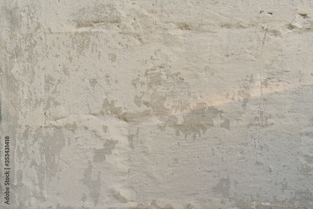 Textural background white wall of an old house