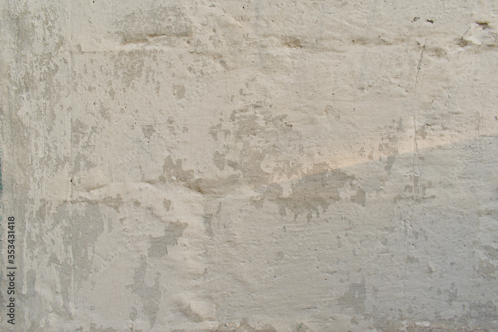 Textural background white wall of an old house Textural background white wall of an old house