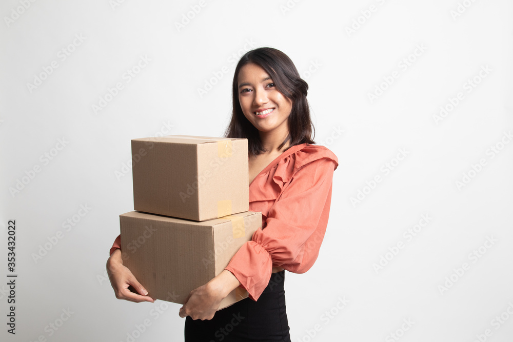 Delivery, relocation and unpacking. young asian woman holding cardboard box . Delivery, relocation and unpacking. young asian woman holding cardboard box .