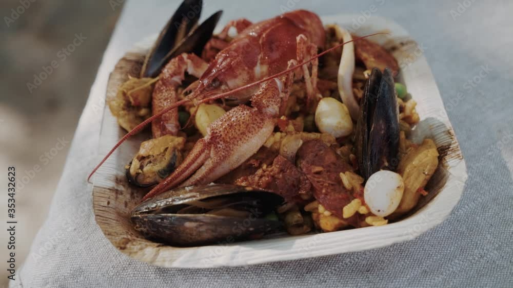 Spanish food - paella a small portion of paella in a typical skillet Spanish food - paella a small portion of paella in a typical skillet