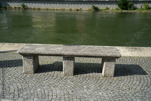 Картината върху платно Benches and chairs at tables invite you to relax and unwind