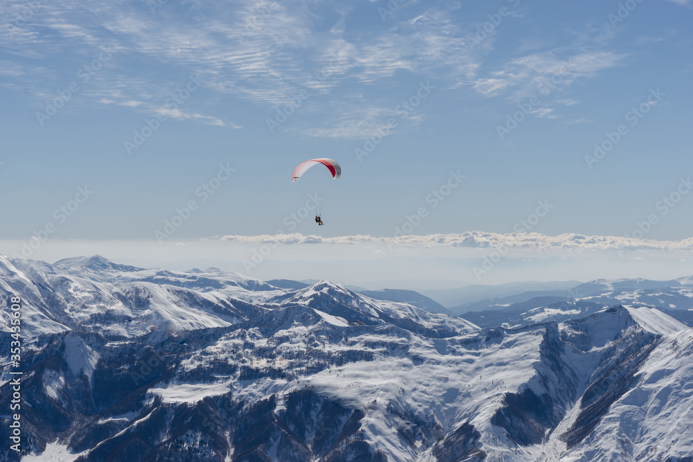 Paragliding with beautiful cloudscape background Paragliding with beautiful cloudscape background
