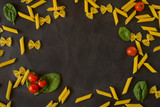 vegetables with italian pasta, macaroni. spinach, cherry tomatoes , cheese. copy space