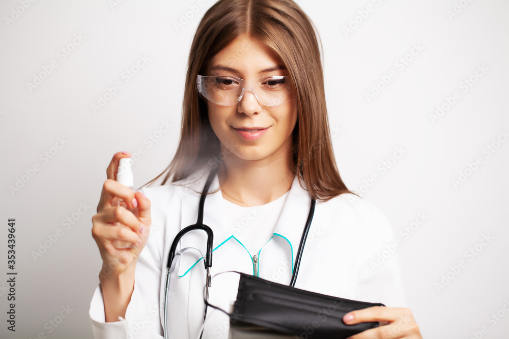 Medicine concept, doctor female in clinic holding personal protective equipment Medicine concept, doctor female in clinic holding personal protective equipment