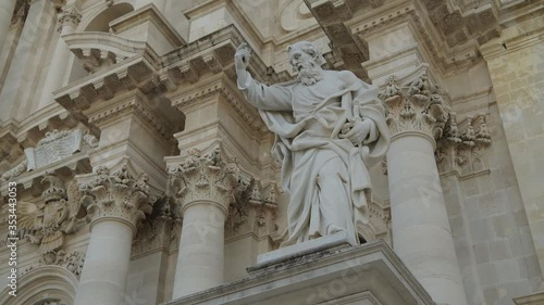 The statues of the apostles Peter and Paul as a part of Cathedral of Siracusa (Syracuse), example of sicilian baroque in the center of Ortygia (Ortigia) island in Sicily 