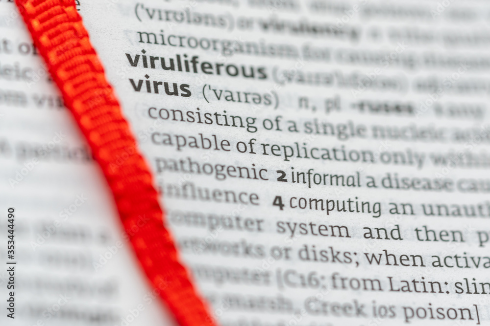 Obraz premium Definition of the word virus on a dictionary page