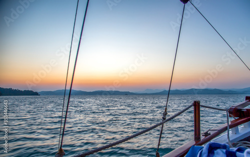 A Phinisi sailboat in Langkawi enjoying beautiful sunset