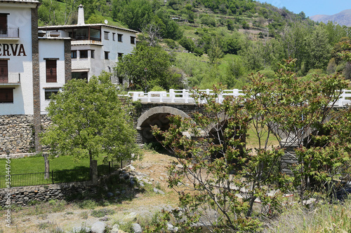 Trevelez Village in the Alpujarras Mountains, Granada Province, Andalusia, Spain - May 29, 2019: white city among nature