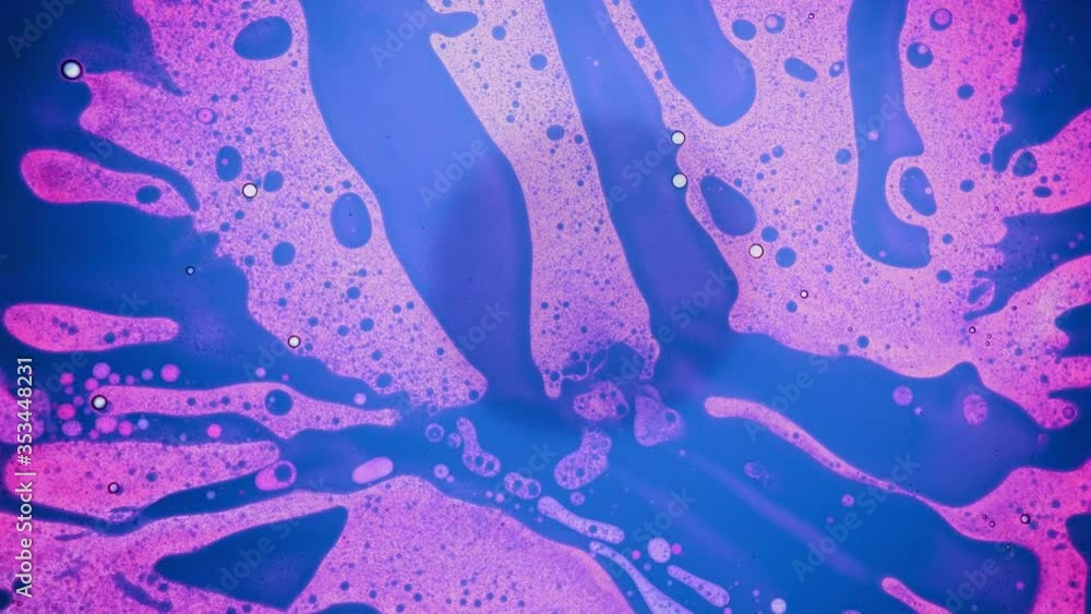 4K psychedelic liquid light show, weird patterns of ink in water, oil, paint, liquids, pulsing bubbles. Colorful background for avant-garde visual performances, logos, music videos, titles, credits
