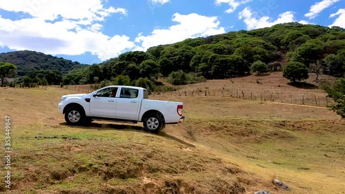 white pick up in mountain