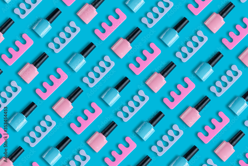 Bright summer pattern on the theme of a trendy pedicure. On a blue background, bottles of blue and pink nail polish and toe separators. Stylish creativity wallpapers for your computer desktop Bright summer pattern on the theme of a trendy pedicure. On a blue background, bottles of blue and pink nail polish and toe separators. Stylish creativity wallpapers for your computer desktop