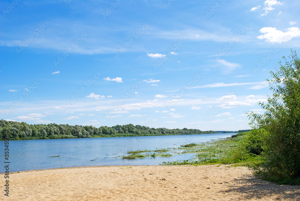 Sandy bank of the Oka River on a sunny summer day