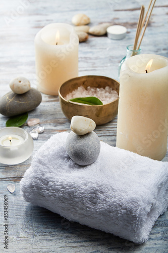 SPA. Set of stone  towel  vase  incense sticks  candles and vessels with salt.