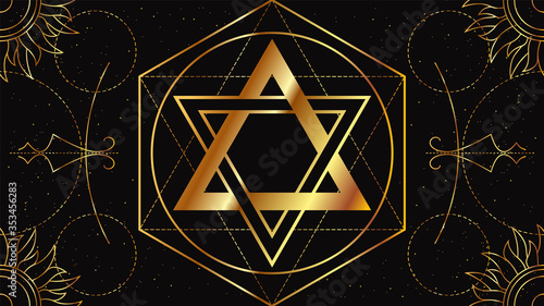 Seal of Solomon. Occult signs of golden color on a black background with geometric ornament. photo