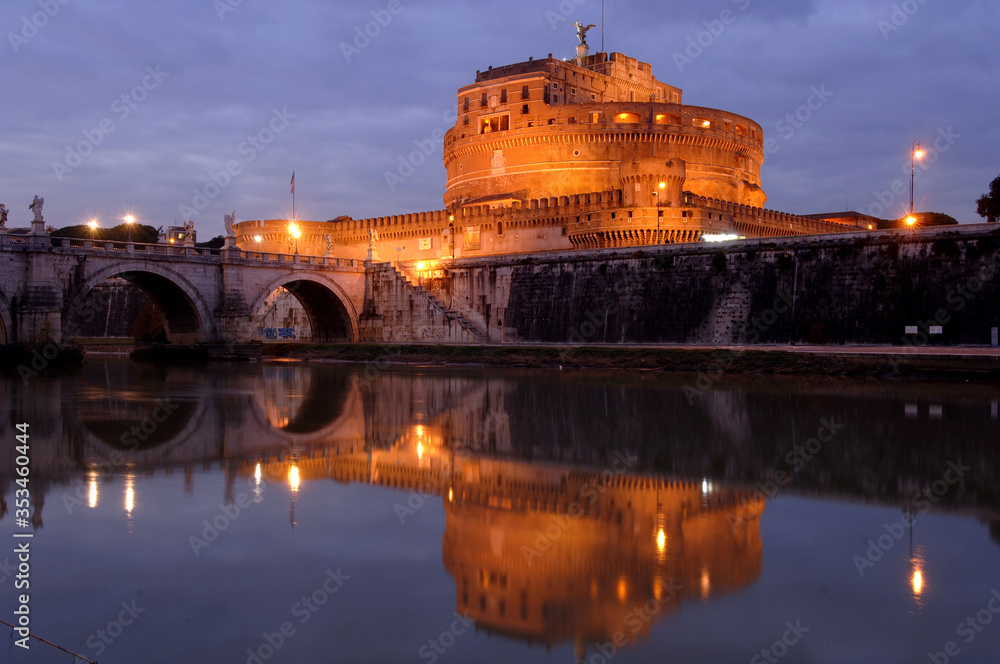 San Angelo Castle with the Tiber river and a beautiful sunset at dusk