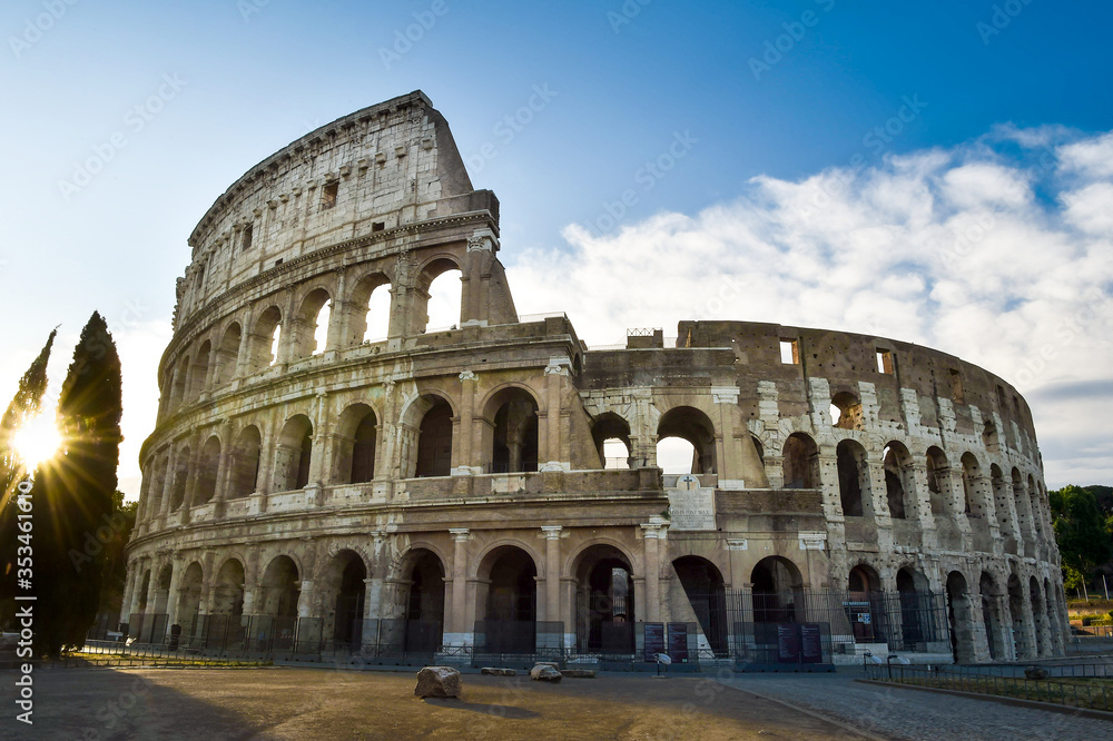  Colosseum or Coliseum in Rome and morning sun, Italy,