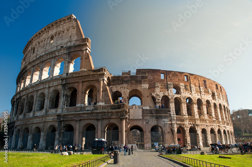 Colosseum, Coliseum, in Rome with green lawn in front on a spring day