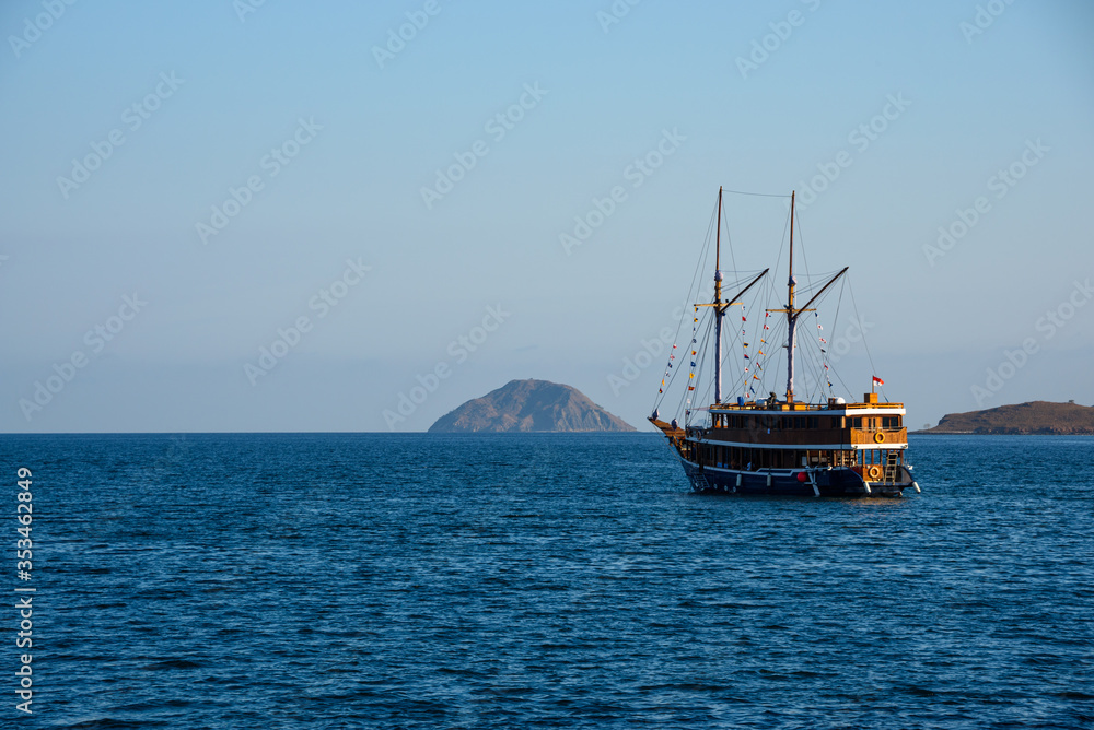 Boat anchored near Komodo Island in East Nusa Tenggara, Indonesia Boat anchored near Komodo Island in East Nusa Tenggara, Indonesia