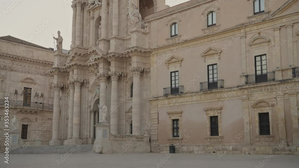Facade of cathedral of Syracuse (Siracusa) on the empty central square of Ortigia (Ortygia) island in Sicily, south Italy Facade of cathedral of Syracuse (Siracusa) on the empty central square of Ortigia (Ortygia) island in Sicily, south Italy