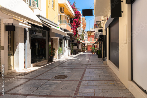 Fototapeta Naklejka Na Ścianę i Meble -  Heraklion city historical center famous Daidalou Street side roads outlet shopping center.