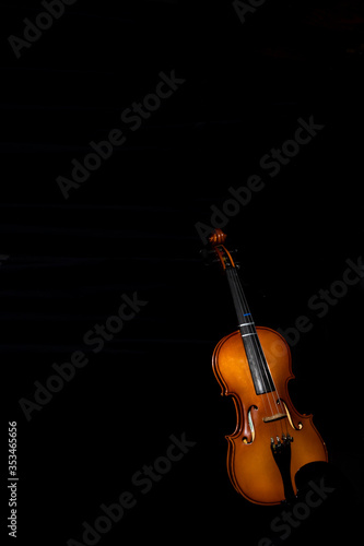 Violin against a black background