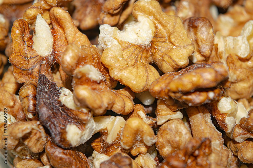 Peeled walnuts close-up. Surface texture. Healthy diet. Peeled walnuts close-up. Surface texture. Healthy diet.