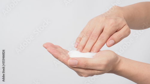 Hands washing. Gesture with foaming hand soap on white background.