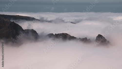 Mountain peaks in dense clouds on Pico do Arieiro. Madeira Island.