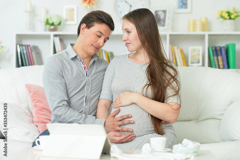 Portrait of happy pregnant woman with husband Portrait of happy pregnant woman with husband