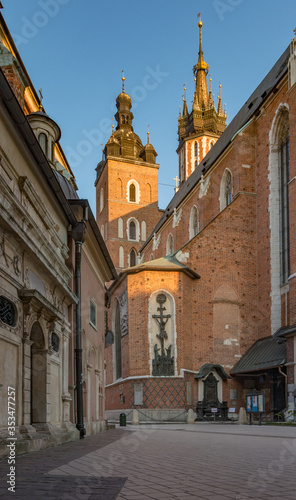 Mariacki square and St Mary's church in the morning, Krakow, Poland © tomeyk