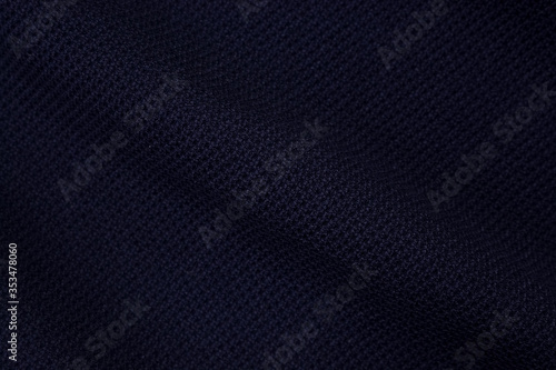 Wallpaper Mural Blue background of fabric from a piece of crumpled clothes. Top view. crumpled polyester. The texture of the fabric, useful as a backdrop. Torontodigital.ca