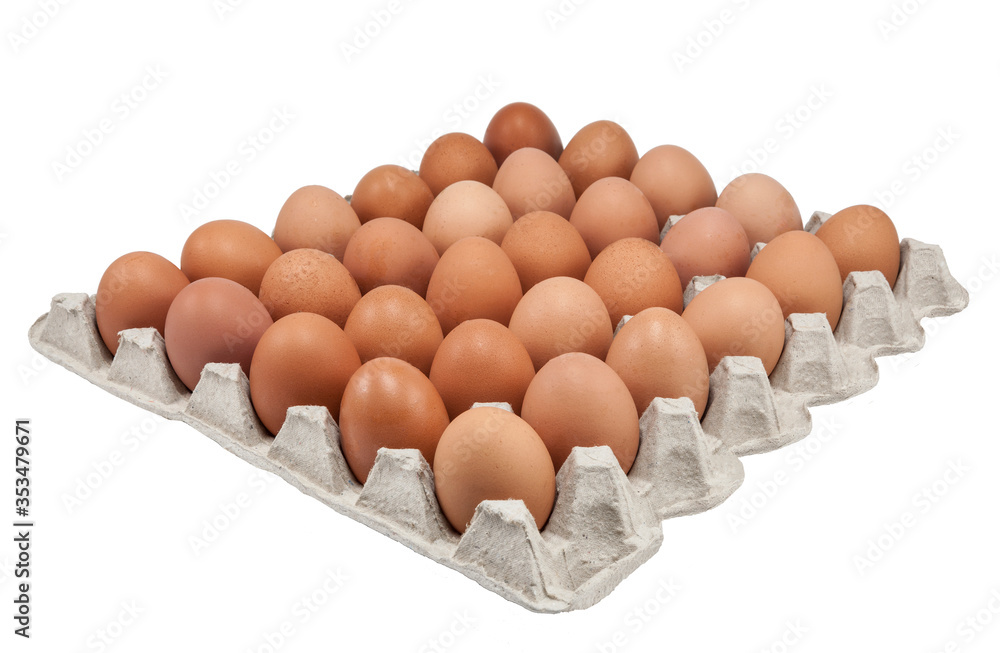 cardboard packaging with brown eggs on a white background isolated closeup cardboard packaging with brown eggs on a white background isolated closeup