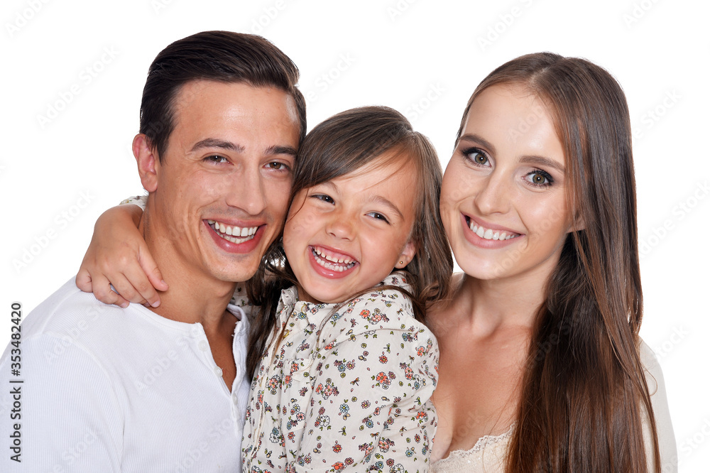 Portrait of happy beautiful family of three posing on white background Portrait of happy beautiful family of three posing on white background