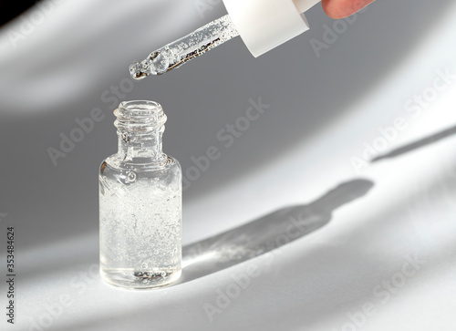 Glass bottle with pipet with essential all skin