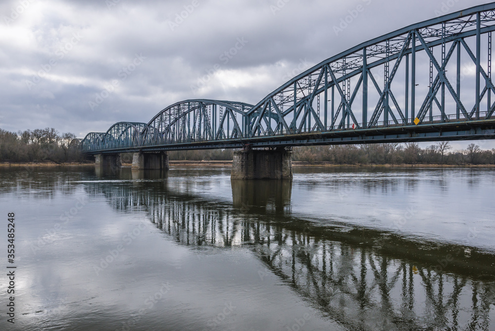 River Vistula with bridge of Josef Pilusdski in Torun city, Poland