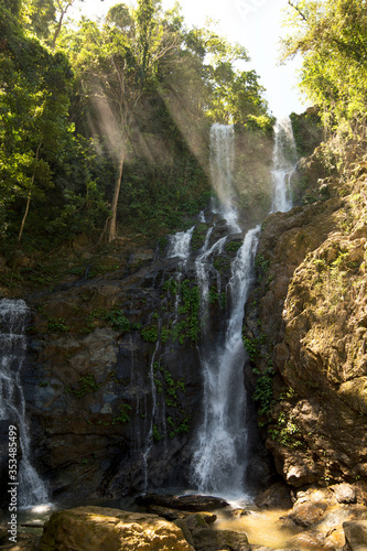 Fototapeta Naklejka Na Ścianę i Meble -  High waterfall in the rainforest on the island of Mindoro in Philippines