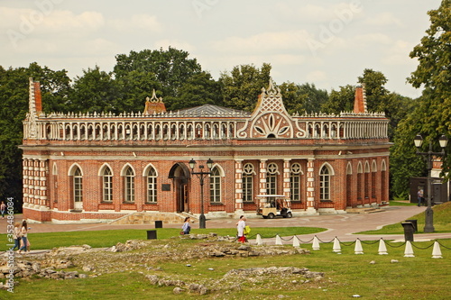 Moscow / Russia – 07 16 2019: 2nd Cavalier house and ancient historical ruins in Tsaritsyno Park Museum on summer day