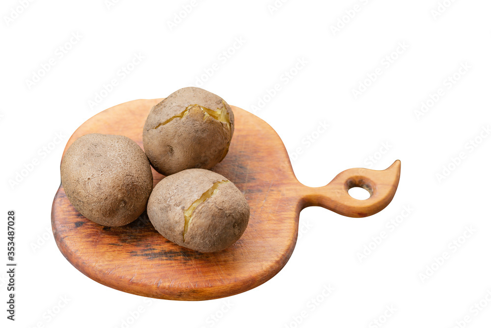 Fototapeta premium Boiled unpeeled potatoes on a cutting Board