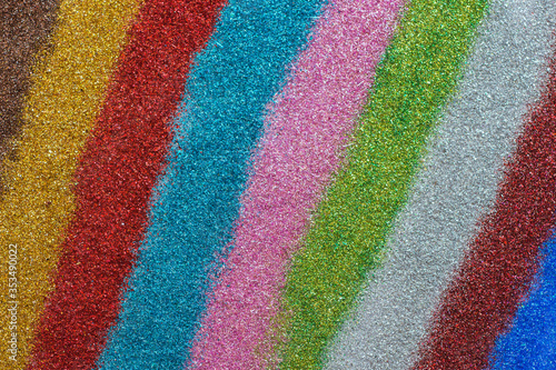 Horizontal multicolor glitter background. Rainbow colors in a glitter texture