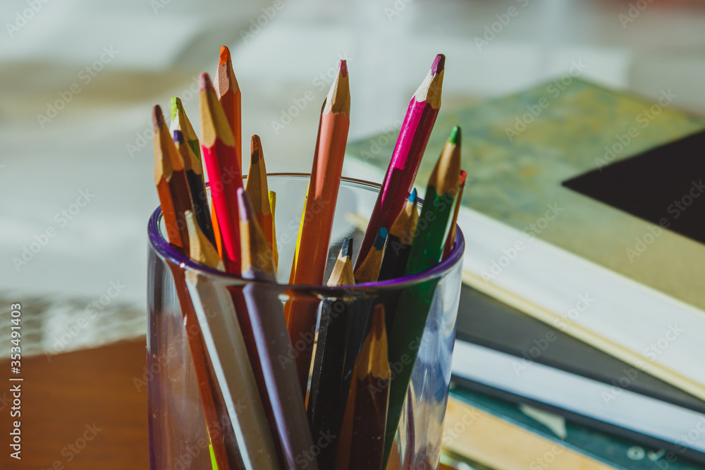 Obraz premium School things close-up: colored pencils, books, notebooks