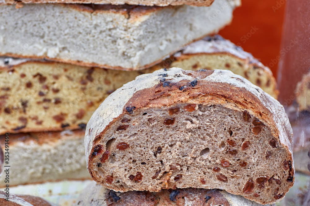 Close-up of artisan bread with grapes passes inside it. Close-up of artisan bread with grapes passes inside it.