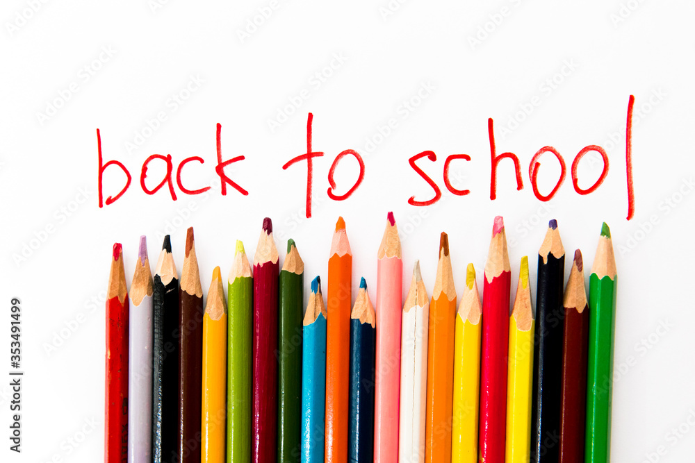 Fototapeta premium School stuff on a white background close up: colour pencils