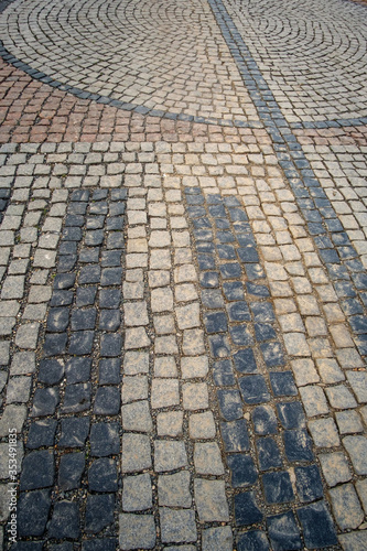 Vintage traditional stone pavement in perspective