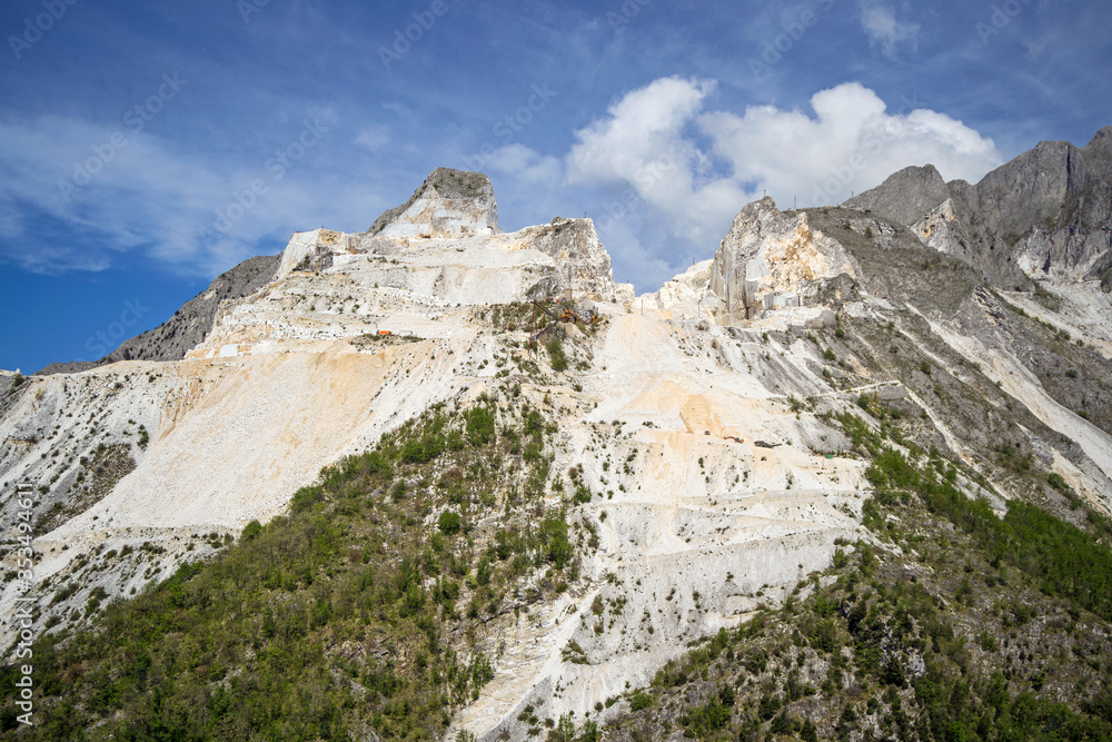 panoramic landscape of white marble quarries of Carrara in 

the Apuan Alps. Colonnata, Massa Carrara district. Tuscany, 

Italy