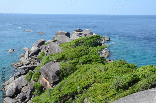 View from the top of a little hill on Similan island in Thailand photo