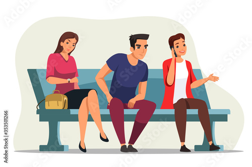 People sitting on blue bench, waiting their turn