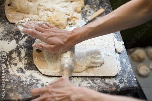 Close up Image of Rolling Pin and Dough