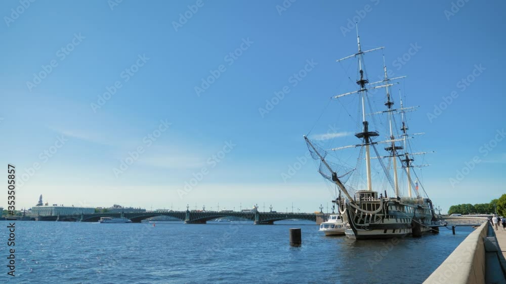 An old frigate in the sunny day, Neva river, St. Petersburg, Russia. An old frigate in the sunny day, Neva river, St. Petersburg, Russia.